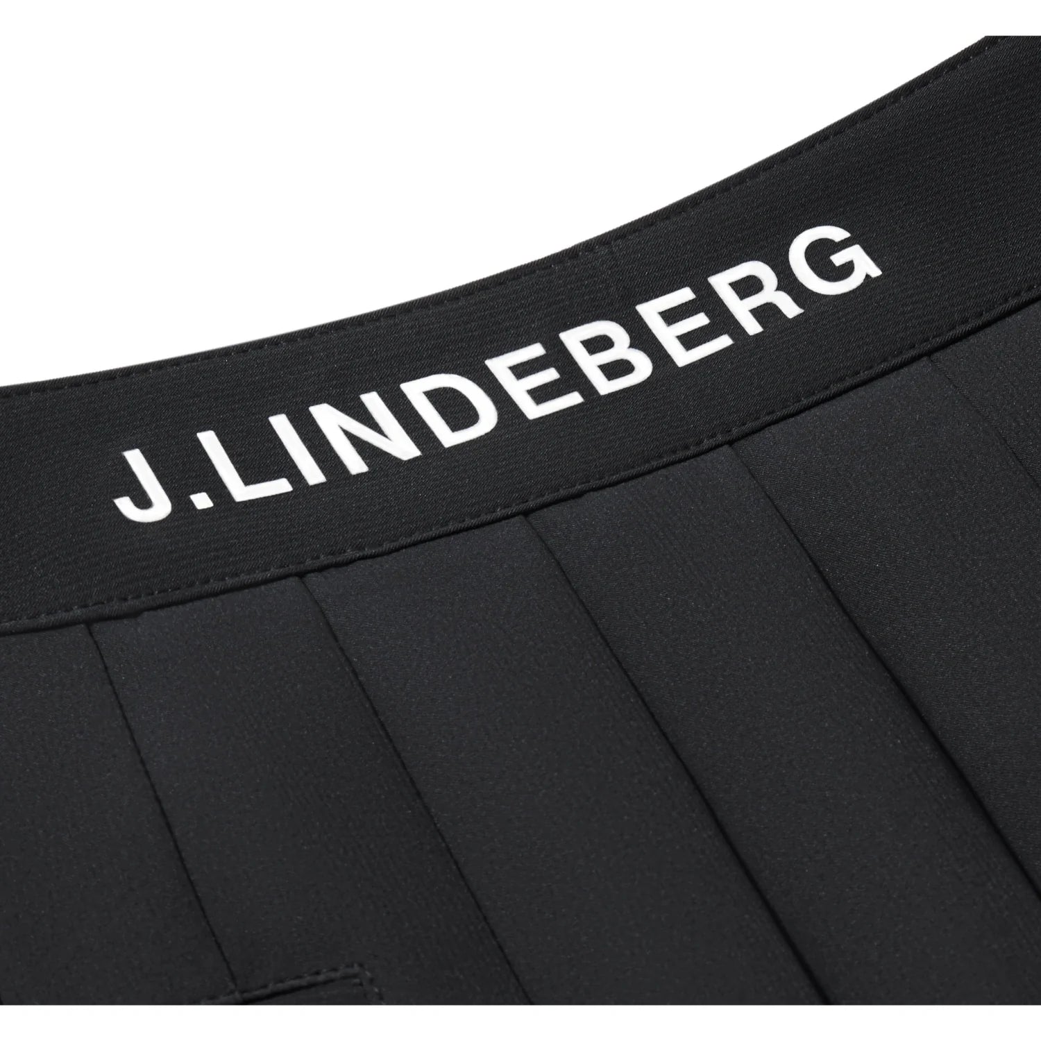 J.Lindeberg Harlow Golf Skirt with stripe hem and integrated inner shorts.
